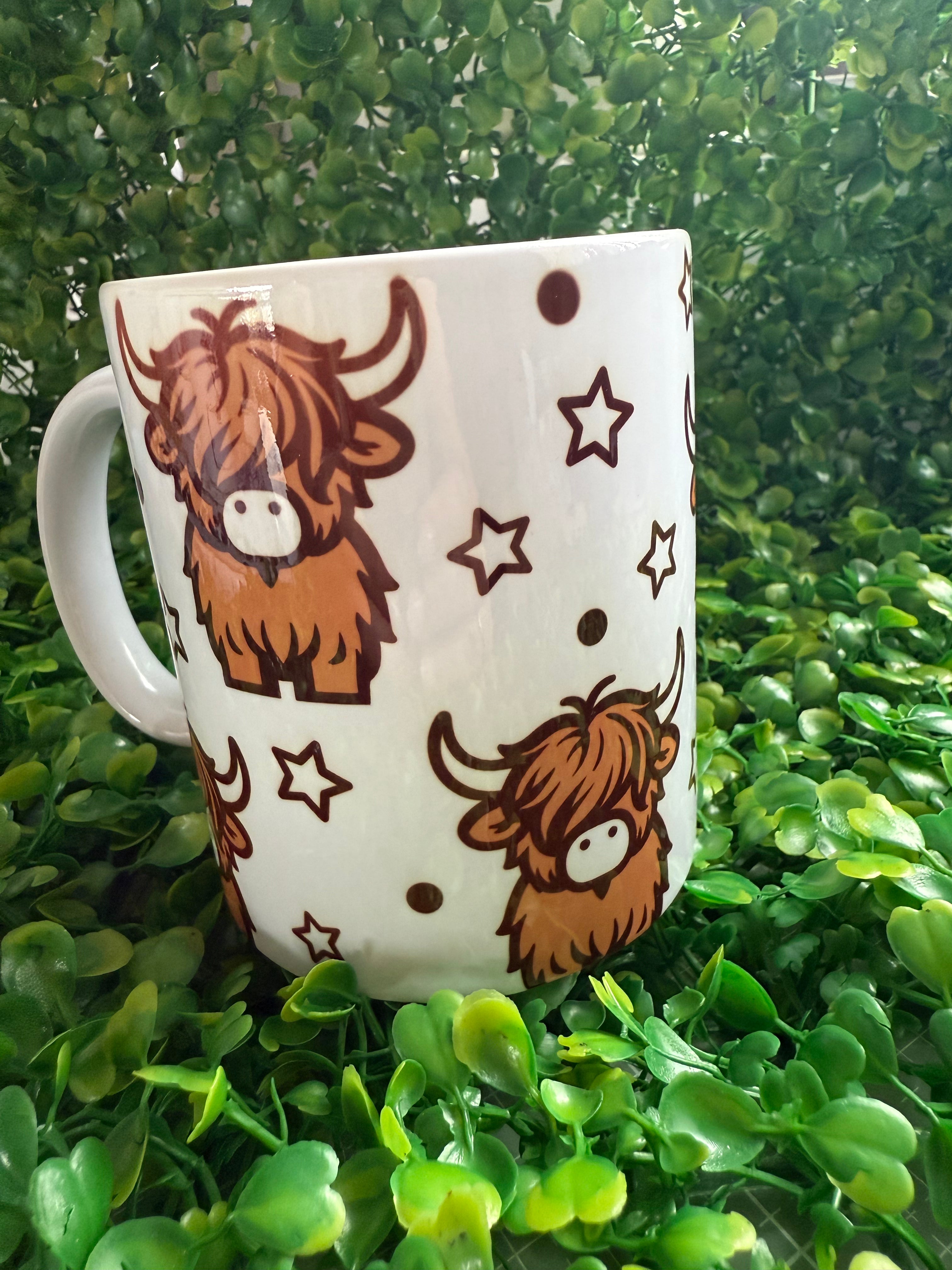 Highland cow print design on mug