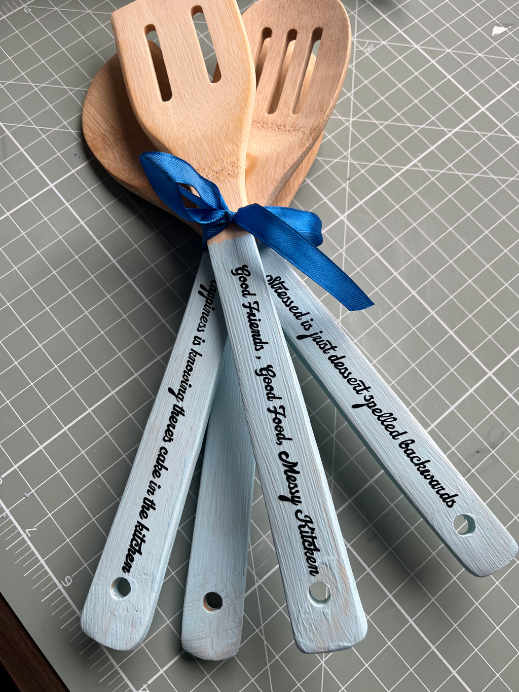 Kitchen colourful wooden spoons with funny quotes
