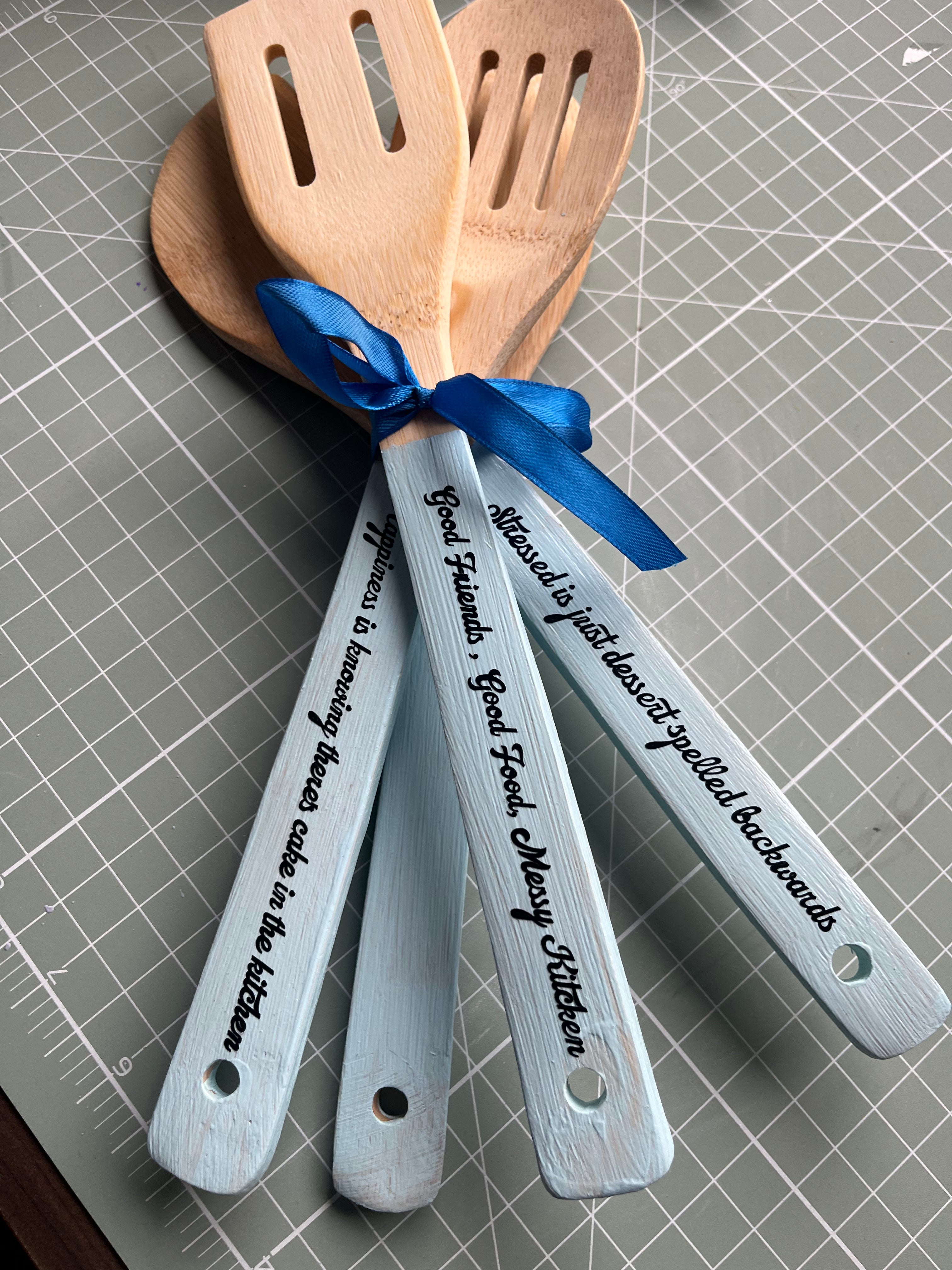 Kitchen colourful wooden spoons with funny quotes