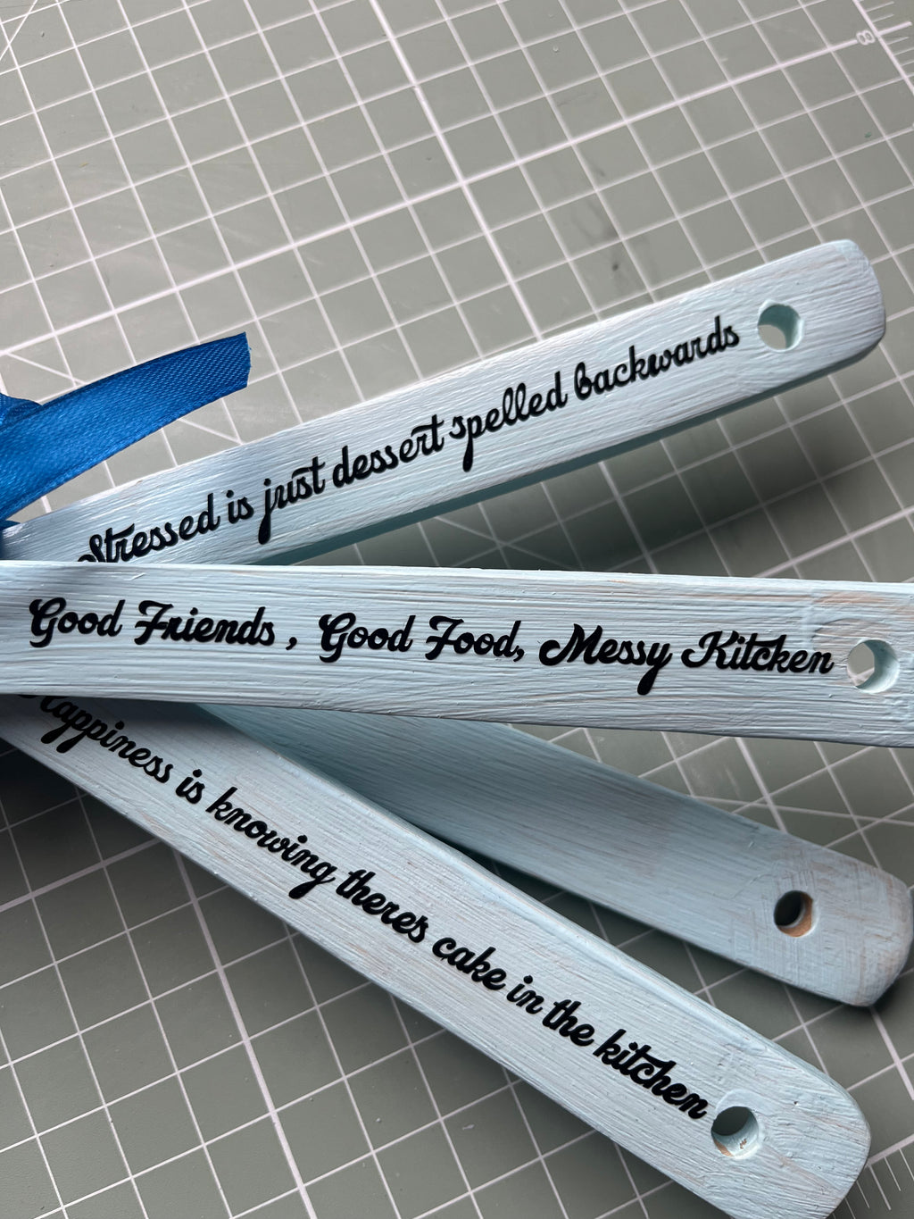 Kitchen colourful wooden spoons with funny quotes