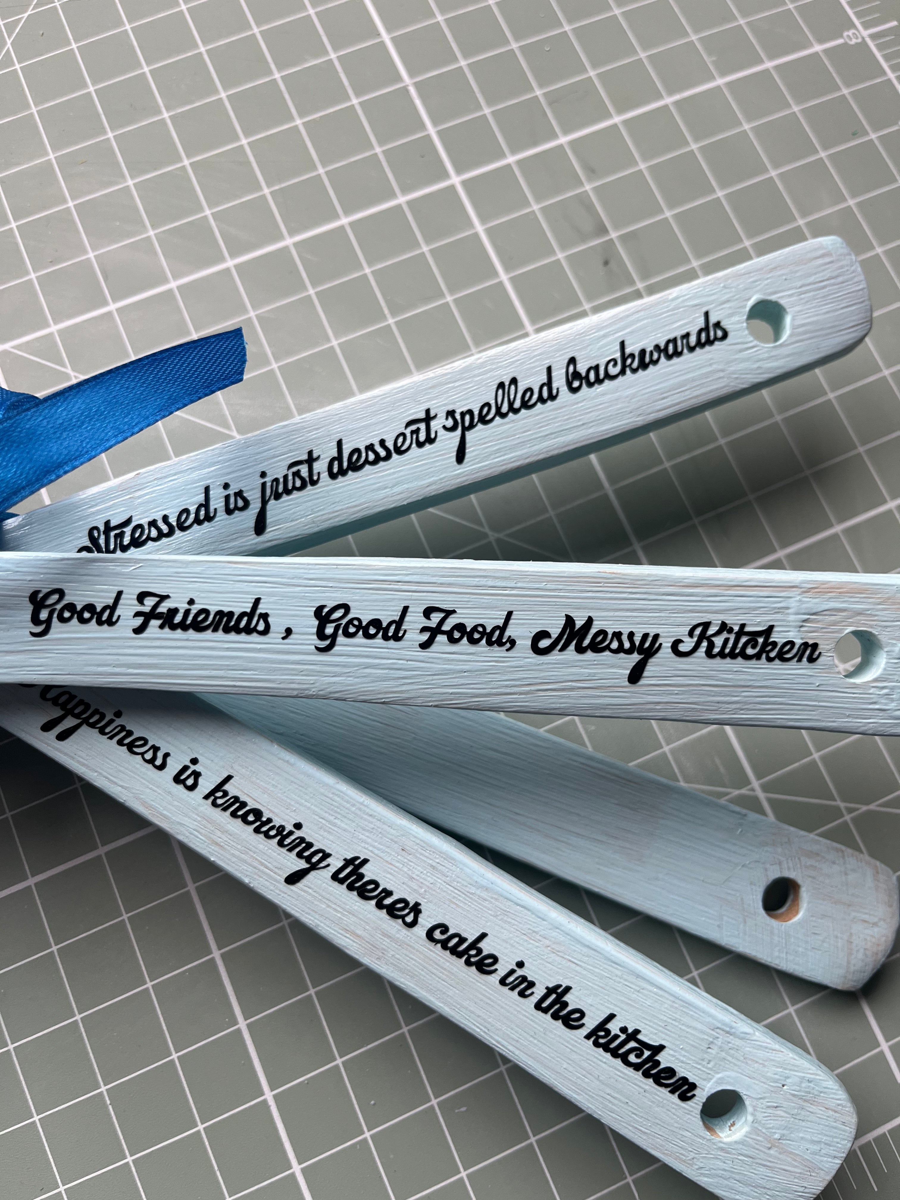 Kitchen colourful wooden spoons with funny quotes