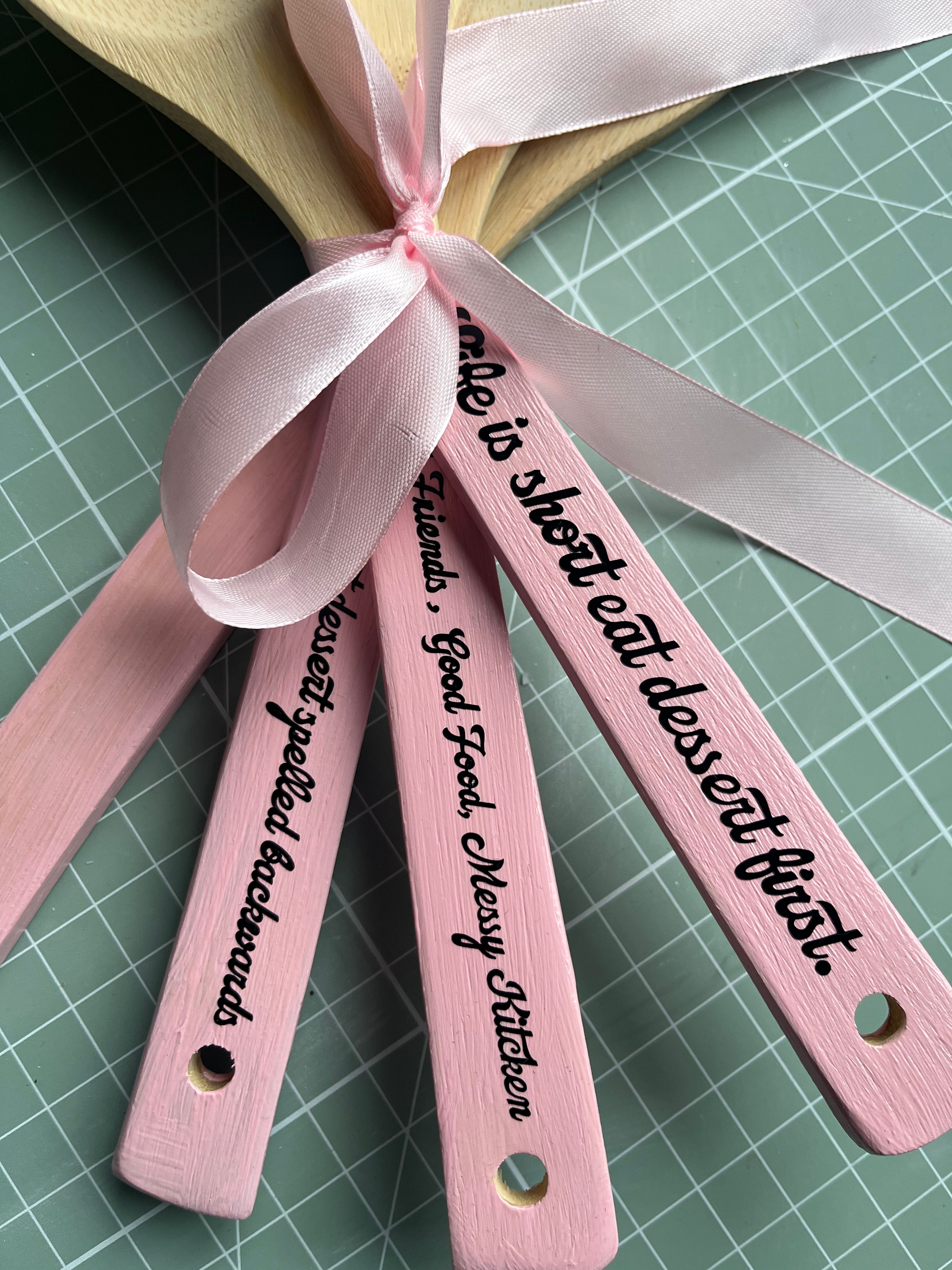 Kitchen colourful wooden spoons with funny quotes